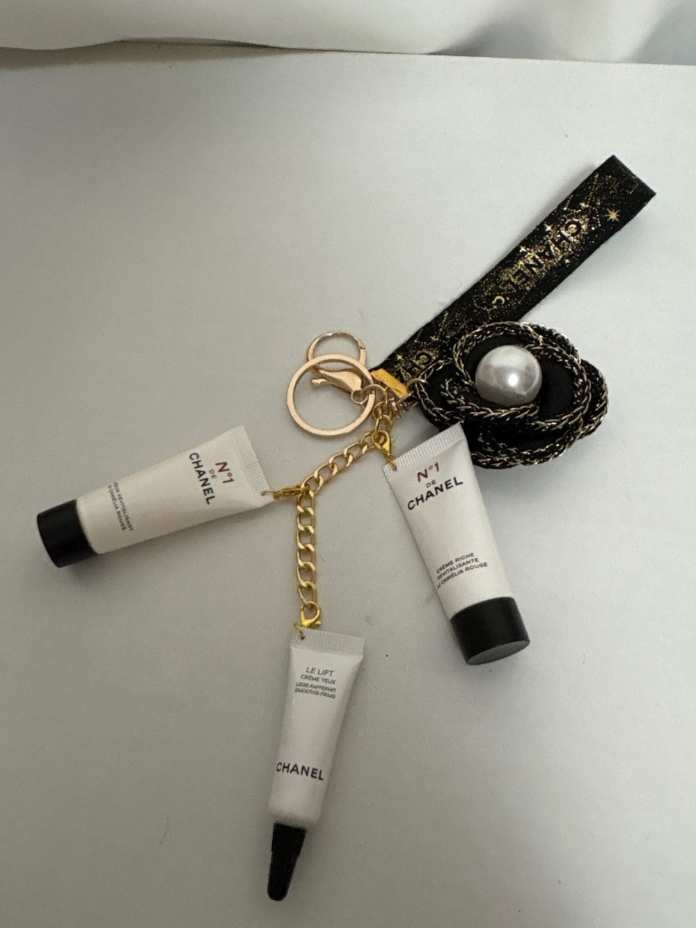 Chanel Minis Travel Ready on Keychain/Bag Charm